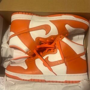Orange and white Nike